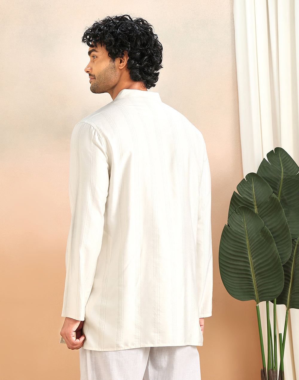 Texture and finish of the White Madhubani Stripe Short Kurta by Fabindia UK
