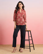 Red Ajrakh Print Top styled for festive occasions