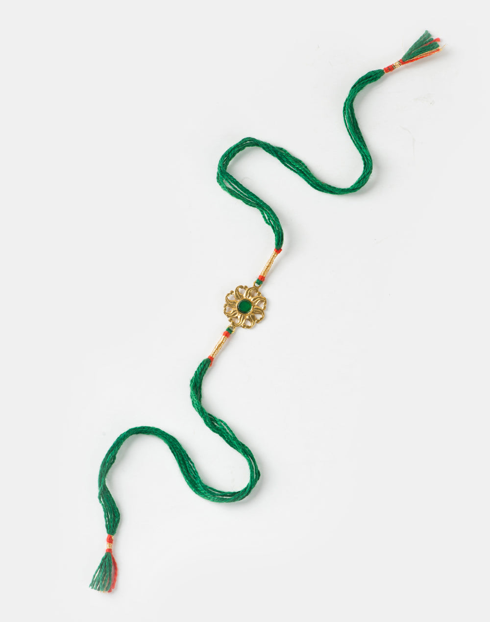 Green Metal Gold Tone Traditional Floral Design With Green Stone Rakhi
