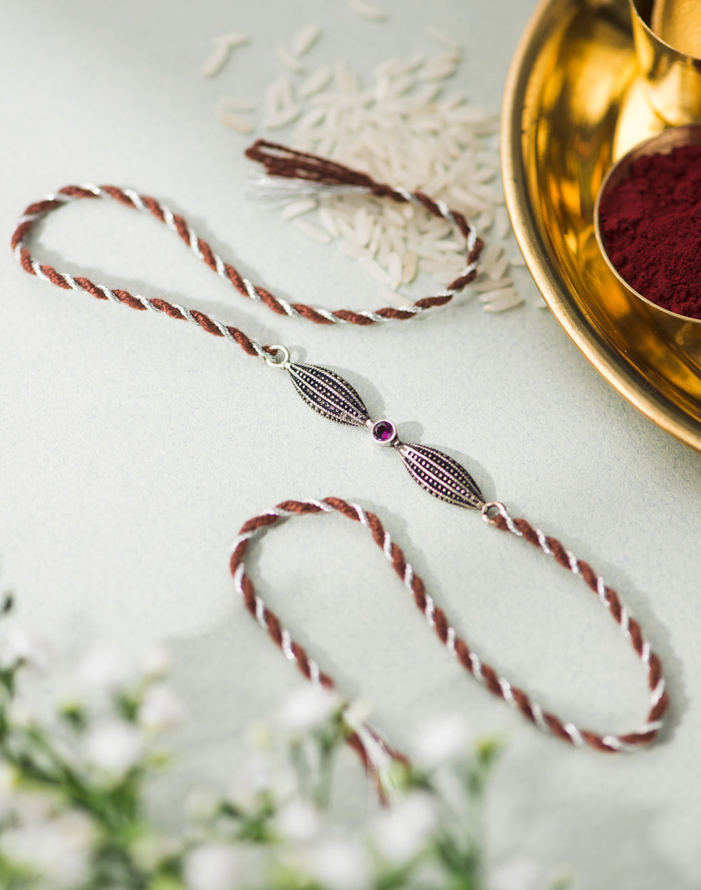 Multi Metal Textured Geometrical Motif Rakhi