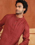 Red Dobby Long Kurta styled for festive occasions