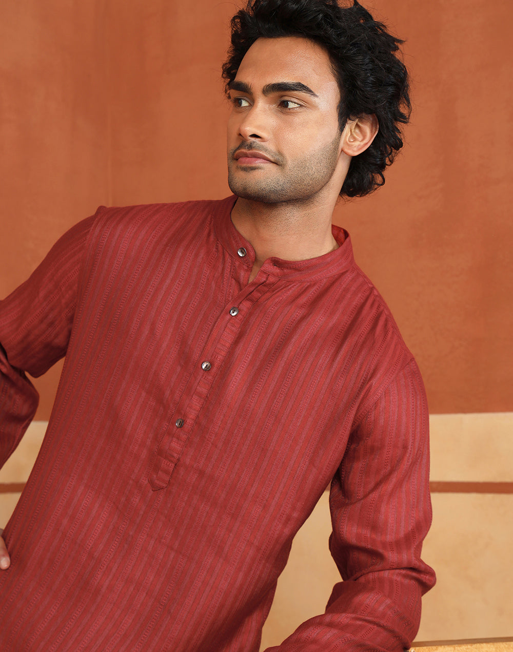 Red Dobby Long Kurta styled for festive occasions