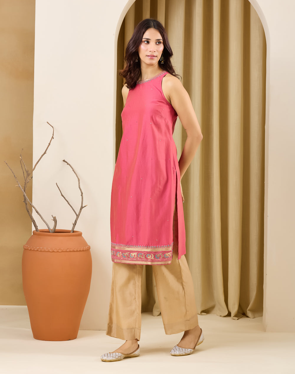 Sleeveless Fuchsia Embroidered Kurta with round neck