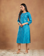 Teal Embroidered Long Kurta with round neck and three-quarter sleeves
