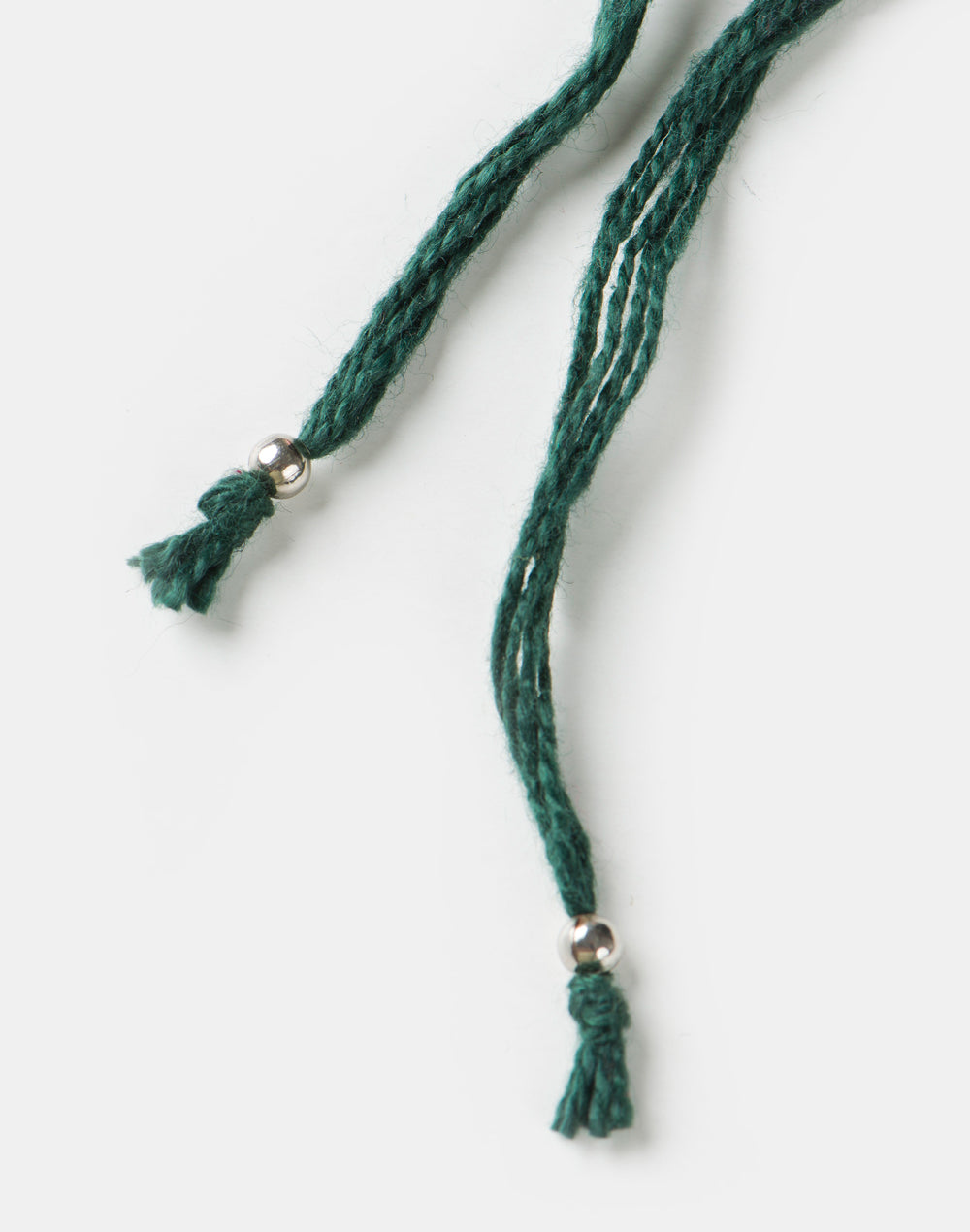 Dark-Green Metal Geometrical Motif With Multi Stones Rakhi