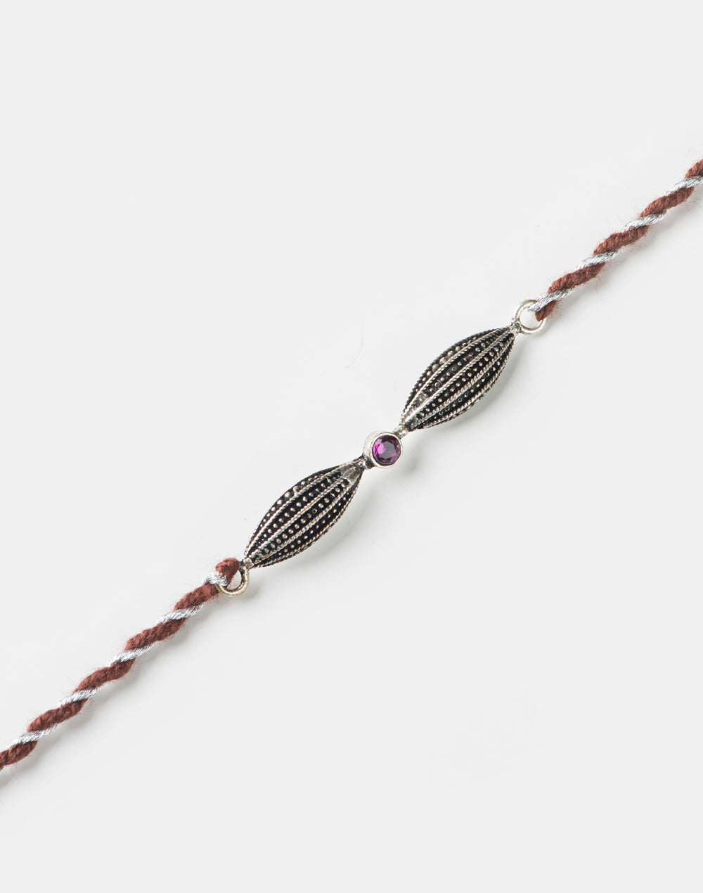 Multi Metal Textured Geometrical Motif Rakhi