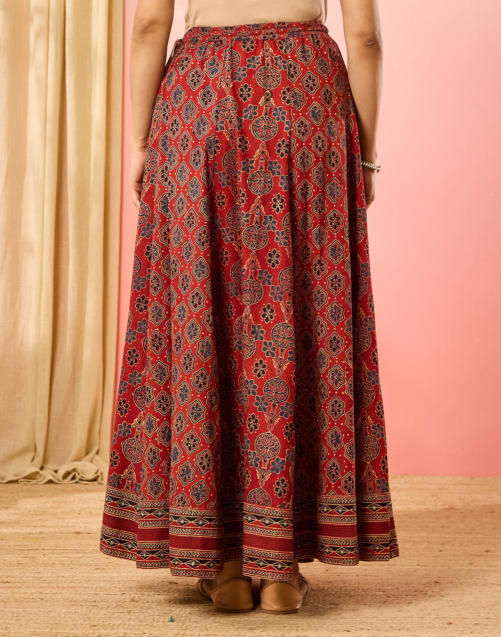 Texture and finish of the Maroon Ajrakh Print Ghera Skirt by Fabindia UK