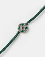 Dark-Green Metal Geometrical Motif With Multi Stones Rakhi