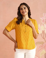 Cotton fabric detail on the Mustard Top