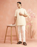 Off-White Stripe Short Kurta styled for festive occasions