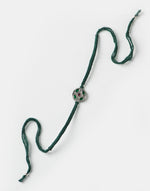 Dark-Green Metal Geometrical Motif With Multi Stones Rakhi