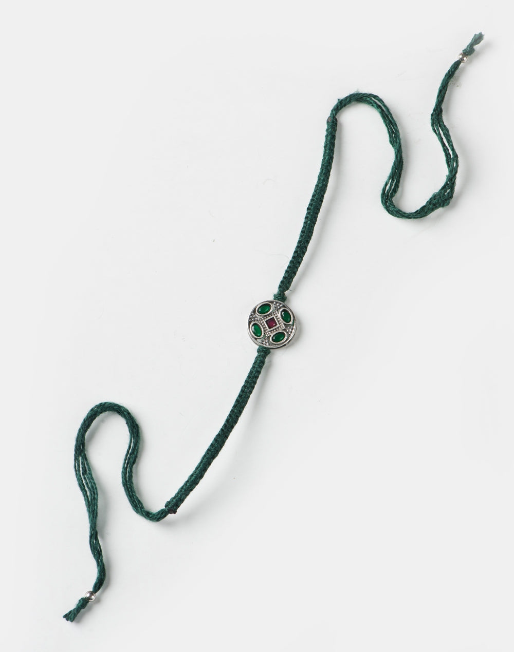 Dark-Green Metal Geometrical Motif With Multi Stones Rakhi