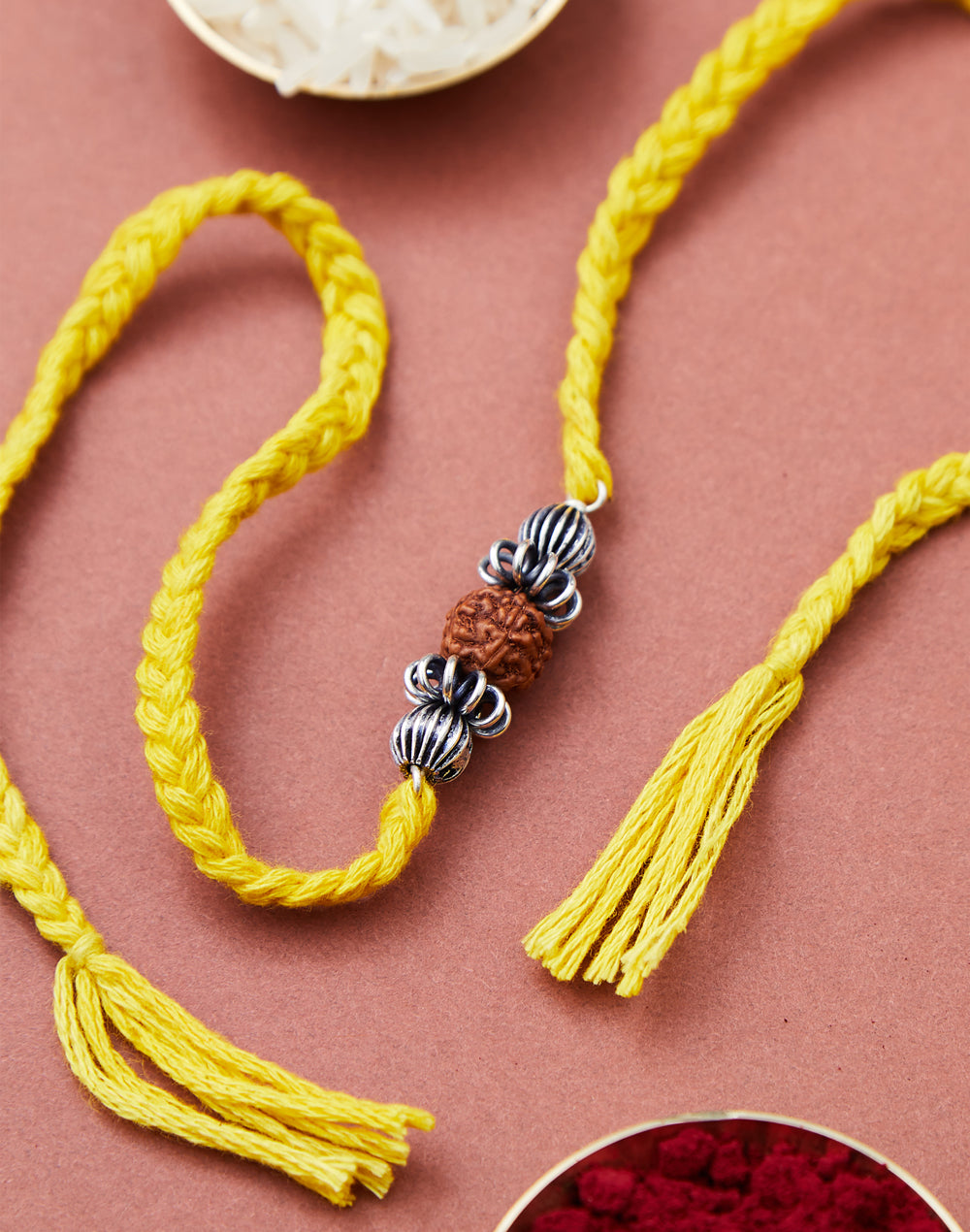 Mustard Metal Rudrakash Rakhi With Textured Beads