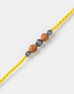 Mustard Metal Rudrakash With Textured Balls Rakhi