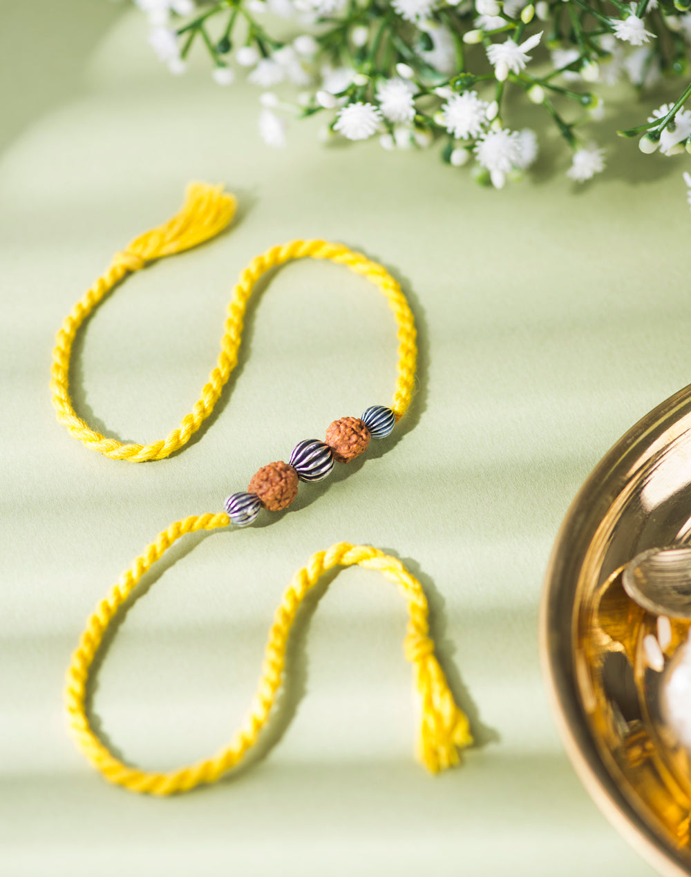 Mustard Metal Rudrakash With Textured Balls Rakhi