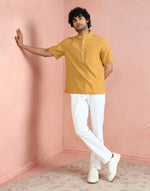 Yellow Shirt styled for festive occasions